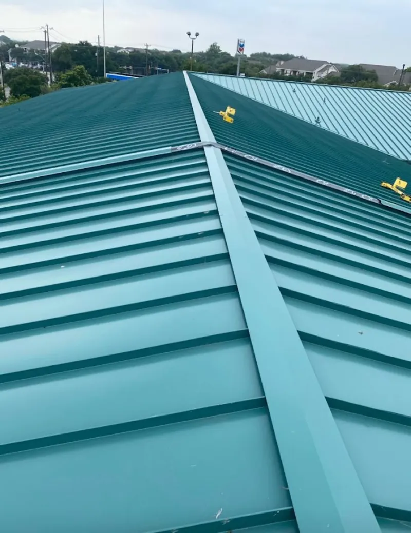 Green commercial metal roof ridge and valley for Metal Roof Repair in Barnstead